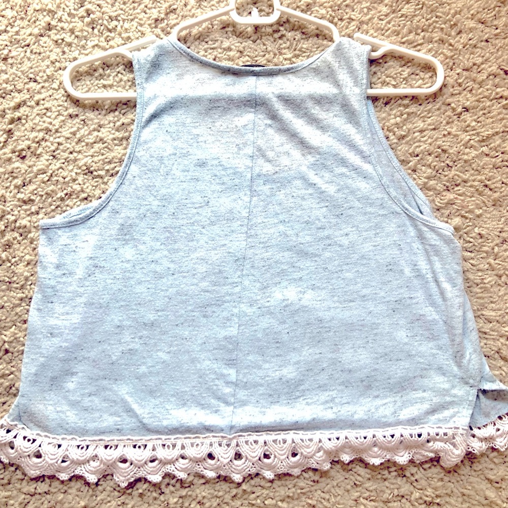 Baby blue tank top with embroidered lace trim